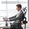 A man in a suit is working on a laptop at a desk, sitting in an ergonomic office chair. Podgląd zdjęcia produktu