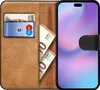 A book-style phone case with cards and cash inside, shown open. Produktbild-Vorschau