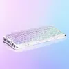 A white mechanical keyboard with transparent, gradient keycaps is displayed on a gradient background. Produktbild-Vorschau