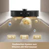 A robotic vacuum cleaner is shown on a reflective surface, with animated bubbles and text highlighting its features. Produktbild-Vorschau