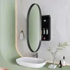 A modern bathroom with a sink, mirror, and cabinet. Podgląd zdjęcia produktu