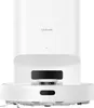 A white robot vacuum cleaner with a charging dock. Voir les images du produit