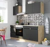 A modern kitchen setup with dark grey cabinets and wood accents, featuring a tiled backsplash and appliances. Produktbild-Vorschau
