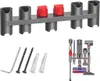 A wall mount accessory organizer for a Dyson vacuum cleaner, along with its mounting hardware and a display of Dyson vacuum attachments. Produktbild-Vorschau