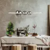 A dining table set for a festive occasion with a Christmas tree and decorative elements. Produktbild-Vorschau