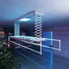 A modern electric ceiling-mounted clothes drying rack with integrated lighting, shown extended and in use in a contemporary indoor space with a city view at night. Produktbild-Vorschau