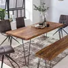 A dining room scene with a wooden table, chairs, and a bench. Produktbild-Vorschau