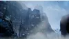 A fantasy-like castle or fortress perched on a rocky, misty mountain. Produktbild-Vorschau