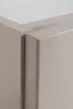 A close-up view of the corner of a beige cabinet, showing the join between two panels. Náhľad obrázku produktu