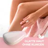 A person's leg is shown with a hair removal device in the foreground and text overlay. Anteprima dell’immagine prodotto