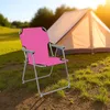 A pink camping chair is set up on a grassy area in front of a tent, with the sun setting in the background. Produktbild-Vorschau