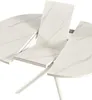A close-up view of a white marble-look extendable dining table with metal legs. Produktbild-Vorschau