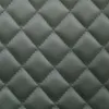 A close-up view of a quilted fabric texture. Produktbild-Vorschau