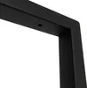A close-up shot of a black metal bracket, showing a small hole on its surface. Produktbild-Vorschau