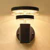 A close-up shot of a modern LED outdoor wall light mounted on a wall. Produktbild-Vorschau