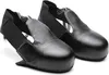 A pair of black safety overshoes with steel toes. Produktbild-Vorschau