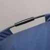 A close-up view of a dark blue fabric with a black metal rod passing through it, attached by a black cylindrical piece. Produktbild-Vorschau