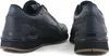 Two black Puma sneakers are shown from a side-rear angle against a white background. Voir les images du produit