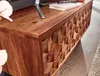 Lowboard Sheesham Massivholz 92x44x35cm TV-Kommode mit geometrischem Türrelief, Gesamtansicht von schräg vorne. Anteprima dell’immagine prodotto
