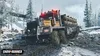 A large truck is driving through a snowy, muddy terrain. Produktbild-Vorschau