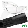 A close-up view of safety glasses and a black handle of an electric hedge trimmer. Náhľad obrázku produktu