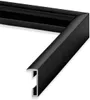 A close-up view of a black picture frame corner. Produktbild-Vorschau