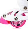 Close-up of the wheel and frame of a pink and white inline skate. Náhľad obrázku produktu