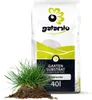 A bag of garden substrate with a clump of grass and soil in front of it. Produktbild-Vorschau