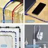 Collage mit durchsichtigen Klebebefestigungen, die Kabel an einer Tischecke, Tischplatte, Boden und einer Badezimmerwand mit Haartrockner und Steckdosenleiste organisieren Productafbeelding-voorbeeld