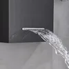 A close-up shot of a modern shower system with water flowing from the showerhead. Náhled obrázku produktu