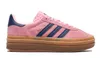 A studio shot of a single pink Adidas Gazelle Bold sneaker against a white background. Náhled obrázku produktu
