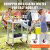 A family enjoying a picnic outdoors with a portable table. Anteprima dell’immagine prodotto