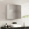 A modern bathroom cabinet with mirrored doors is mounted above a sink. Podgląd zdjęcia produktu