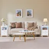 A living room scene with a sofa, coffee table, and two nightstands. Produktbild-Vorschau
