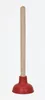 A red and natural colored plunger with a wooden handle is shown against a white background. Náhľad obrázku produktu