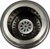 A close-up view of a sink drain with a strainer basket. Produktbild-Vorschau