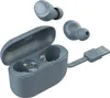 A set of gray wireless earbuds and their charging case, with a USB charging cable attached to the case. Anteprima dell’immagine prodotto