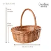 A wicker basket with dimensions indicated by measurement lines and text. Produktbild-Vorschau