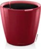 A red, high-gloss planter with a self-watering system. Voir les images du produit