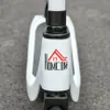 A close-up view of the front of a white electric scooter, showing the brand logo. Náhled obrázku produktu