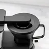 Close-up view of a black coffee maker. Produktbild-Vorschau