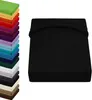 A stack of colorful fitted sheets is shown on the left, and a single black fitted sheet is displayed prominently on the right. Produktbild-Vorschau