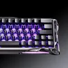 A close-up view of a gaming keyboard with purple backlighting. Produktbild-Vorschau