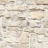 A close-up view of a stone wall texture. Produktbild-Vorschau