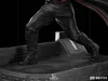 A close-up view of the lower legs and boots of a character standing on a platform. Náhled obrázku produktu