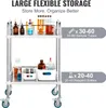 A laboratory cart with various lab equipment and containers on its shelves. Podgląd zdjęcia produktu