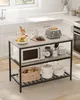 A kitchen island with various kitchen appliances and food items. Produktbild-Vorschau