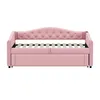 A pink upholstered daybed with a pull-out trundle bed is shown from the front on a white background. Produktbild-Vorschau