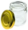 A clear studio shot of an empty glass jar with a gold metal lid next to it. Produktbild-Vorschau