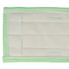 A close-up view of a white fabric mop pad with green trim and stitching. Produktbild-Vorschau